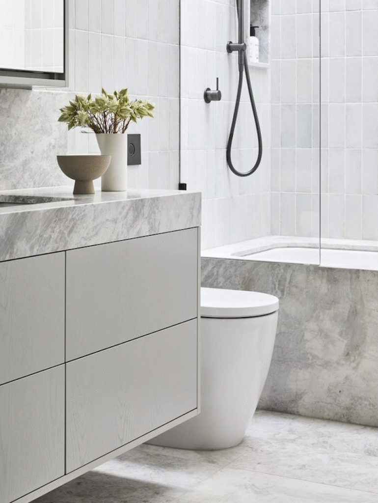 Floating vanity with push-to-open drawers and a minimalist design